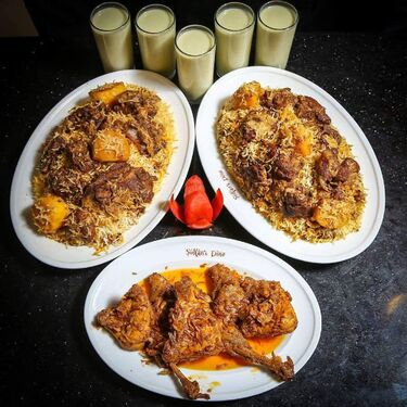 send sultans dine- 5 person kachchi biryani with chicken roast and borhani to dhaka
